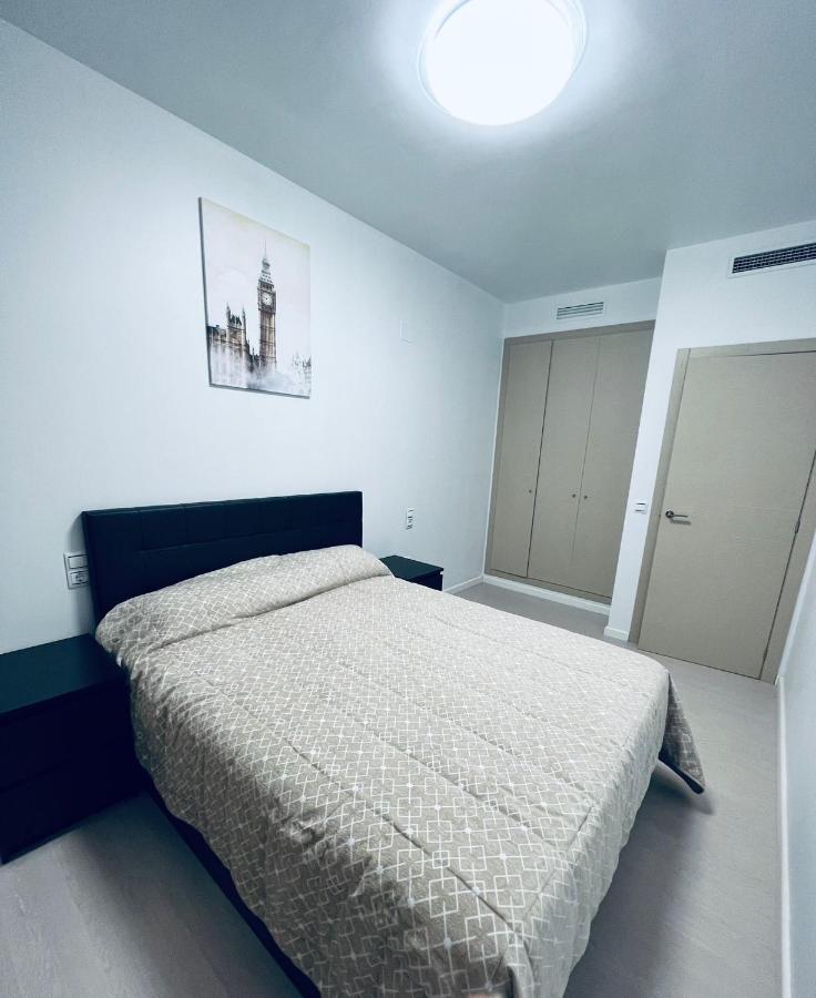 شقة Apartamento Coman Av Rey Juan Carlos I تورينت المظهر الخارجي الصورة